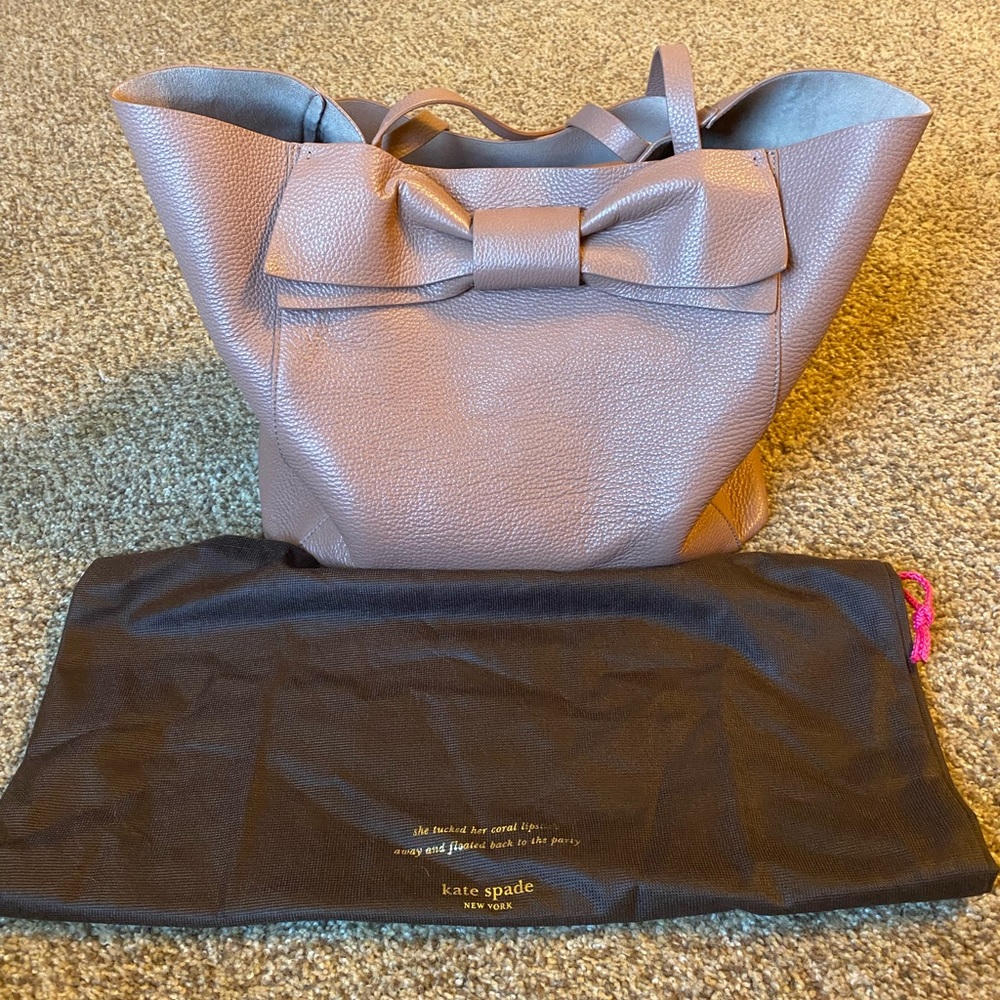 Well loved brown leather Kate spade bow bag